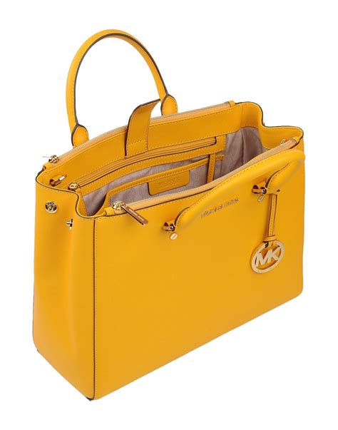 Michael Kors purses yellow